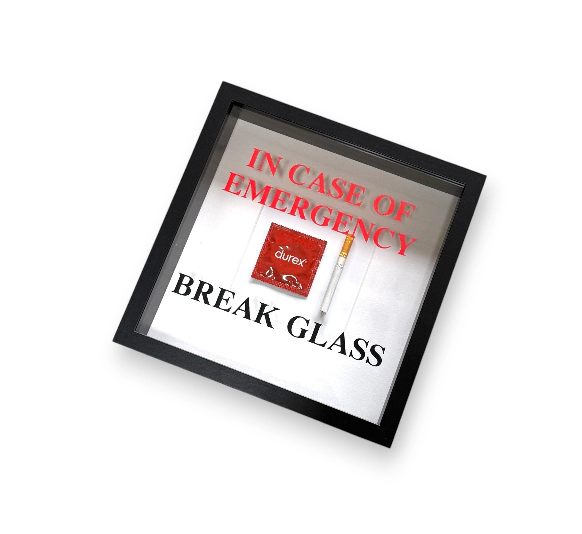 "In Case of Emergency Break Glass" – Wandbild mit Kondom/Zigarette schwarzer Rahmen -  from DieBallerei