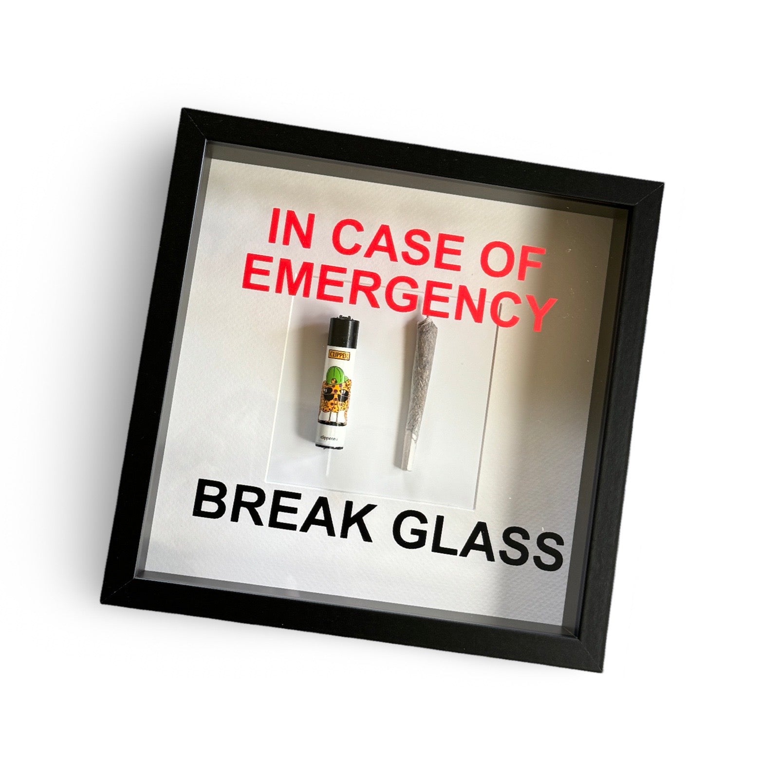 Wandbild/Bild „In Case of Emergency - Break Glass -  Joint/Rauchen Spaß mit Bilderrahmen schwarz